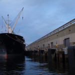 Removal and replacement of 1100 lf of timber pile and timber chock fender system. Resurfacing concrete facia and installation of new Ultra High Molecular Weight Polyethylene ship fender panels.