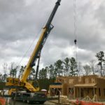 Crofton Crane Rental & Riggin's 80-ton sets roof trusses.