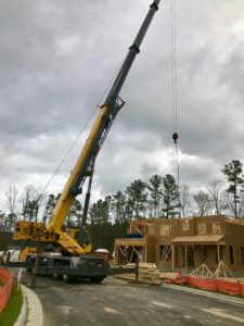 Crofton Crane Rental & Riggin's 80-ton sets roof trusses.