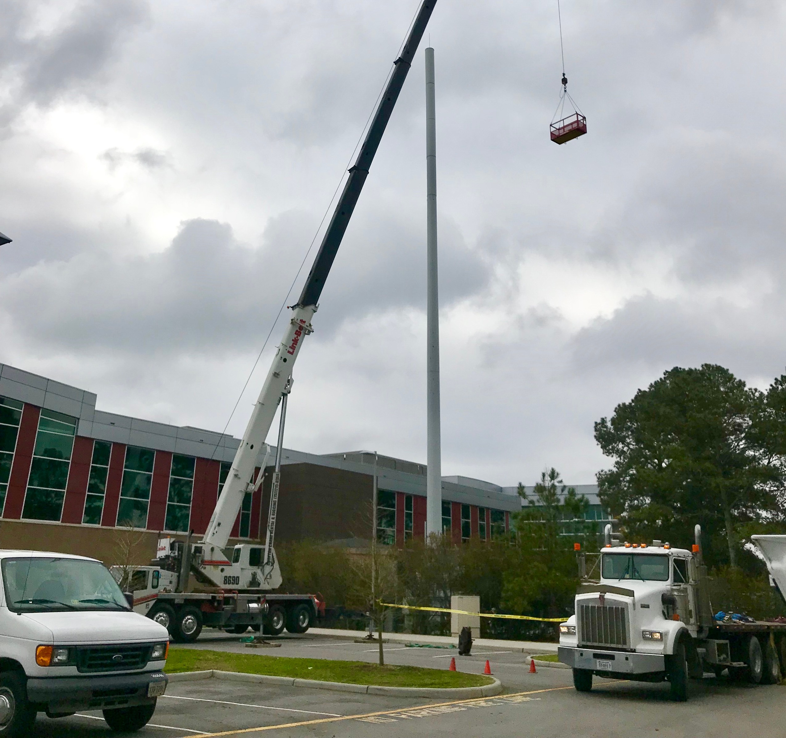 Crofton Crane Rental & Rigging's 90-ton Link-Belt repairs telecommunications tower.