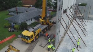 Crofton Crane Rental & Rigging's 300-ton Grove places tilt up panels in Chesapeake, VA.