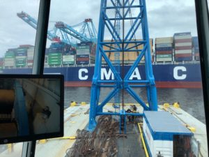 Crofton Crane Rental & Rigging's 350-ton floating derrick, The Samson, lifts 110-ton generator on to the Theodore Roosevelt.