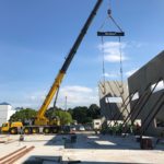 Crofton Crane Rental & Rigging's 300-ton Grove places tilt up panels in Chesapeake, VA.