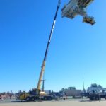 Crofton Crane Rental & Rigging's 110-ton Grove lifts cable reel with 215 of boom at Norfolk terminal.