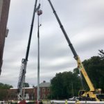 Crofton Crane Rental & Rigging's 165-ton Grove setting a light tower.