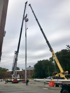 Crofton Crane Rental & Rigging's 165-ton Grove setting a light tower.